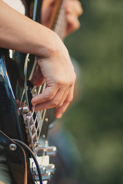 istock Electric bass played during a show 1421515404