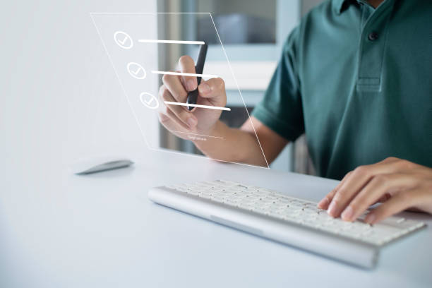 istock Businessman work from home handling documents E-signing, signing digital contracts electronic signing electronic signature through internet technology document data management smart contract agreement 1421516814
