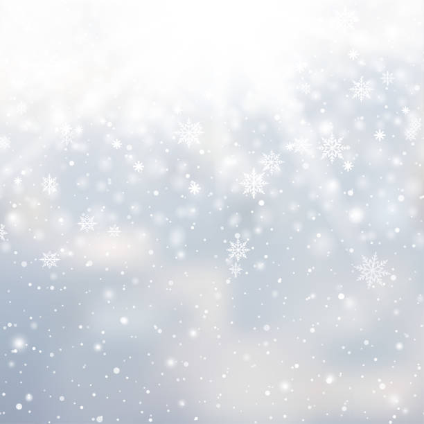 istock Winter snowfall and snowflakes on light blue background. Xmas and New Year background. Vector 1421518899