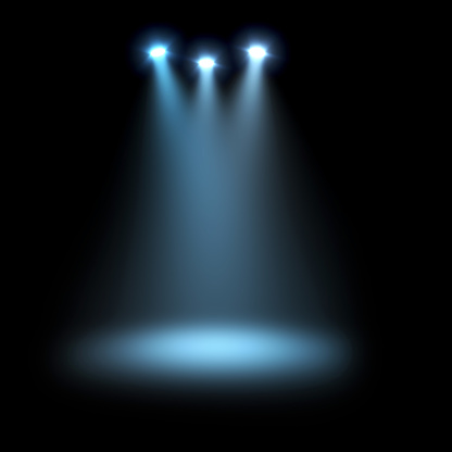 Three bright and shining spotlights projecting volume lights and illuminating a stage, isolated on a black background. Special effect for image editing, photo retouch, overlay and screen blend modes. No people with copy space.