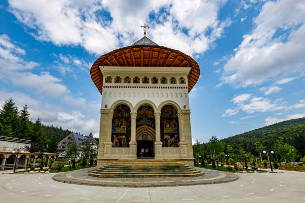 the monastery of putna in the bucovina of romania - voronet imagens e fotografias de stock