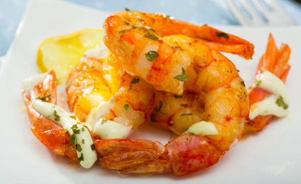 istock Grilled shrimps with garlic sauce 1421525235