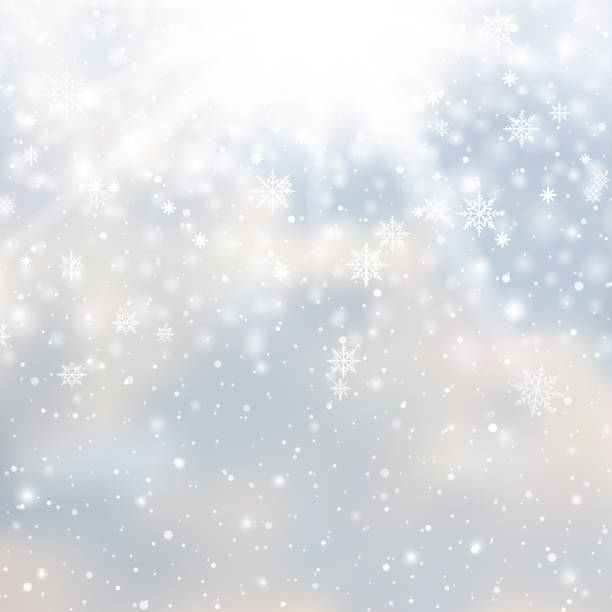 istock Winter snowfall and snowflakes on light blue background. Xmas and New Year background. Vector 1421526409