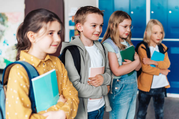 istock elementary school children  in a row for class photo 1421536283