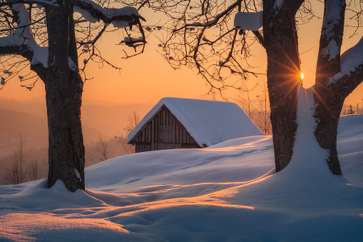Early frozen morning in a carpathian winter mountain village.