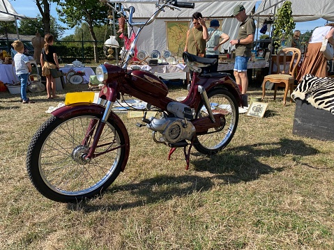 Hulsberg,  the Netherlands, -  September 04, 2022. Brocante Market  with old moped and motorcycle in the Limburg country near the village cold Hulsberg.