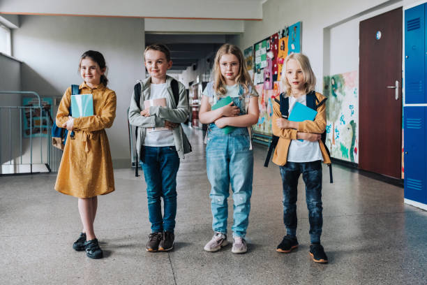 istock elementary school children  in a row for class photo 1421538094