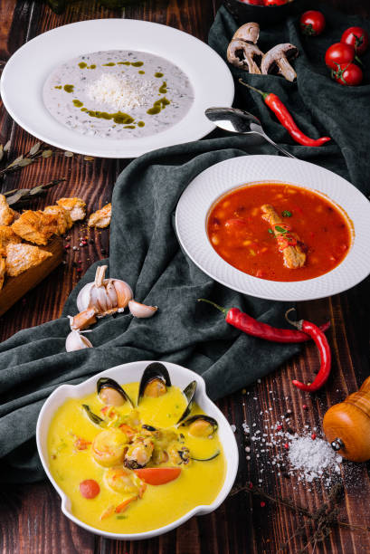 istock Three different vegetable cream soups on wooden 1421546122