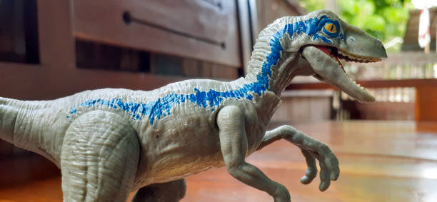 istock Velociraptor dinosaur toy 1421548393