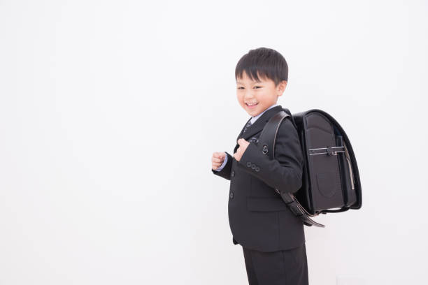 Japanese boy carrying a school bag