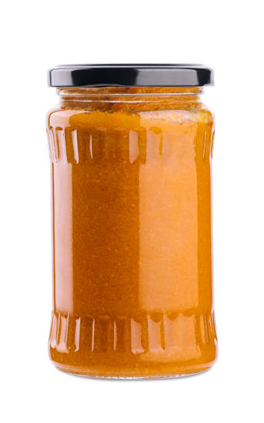 istock The glass jar with squash caviar on white 1421552307
