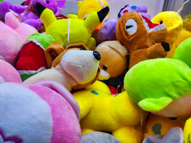 istock Image of soft toys inside a claw machine 1421557957