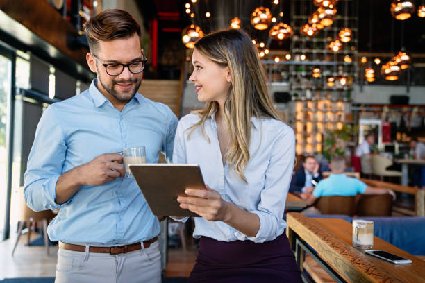 istock Business colleagues having conversation during coffee break 1421558604
