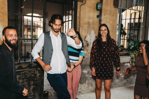 istock People are dancing in a loft during a party 1421560148