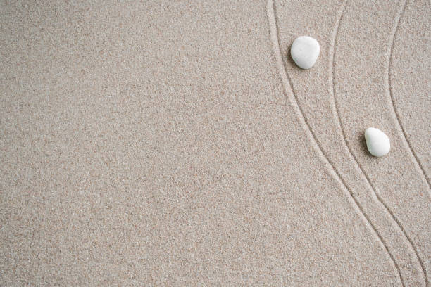 istock Japanese Zen Garden with Pebble with Line on Sand. 1421564544