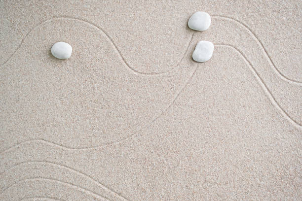 istock Japanese Zen Garden with Pebble with Line on Sand 1421564545