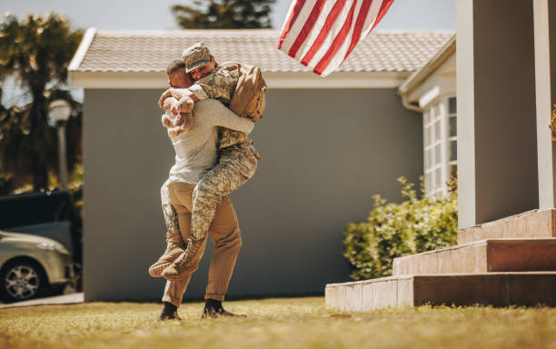 istock Joyful military homecoming 1421564939