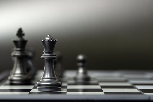 chess pieces on the wood stair by ranking