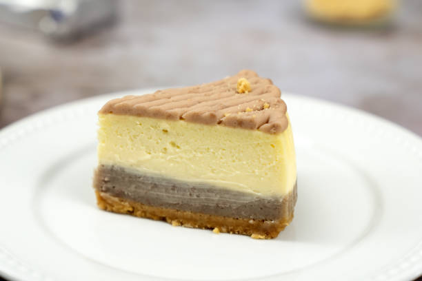 istock Taro cheese cake on wooden board 1421566752