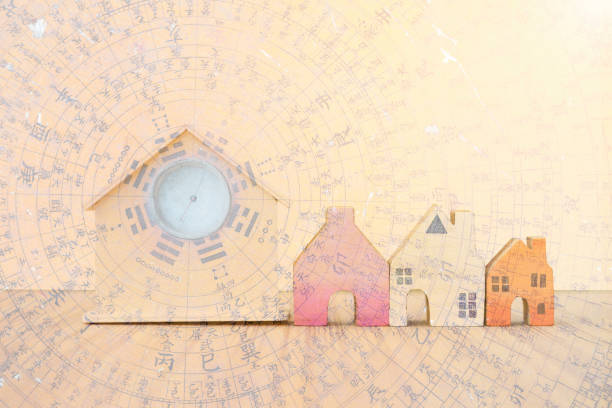 Abstract Miniature wooden house with feng shui compass filter Abstract Miniature wooden house with feng shui compass filter, property and real estate business concept feng shui stock pictures, royalty-free photos & images