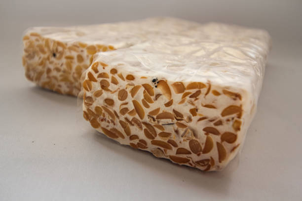 istock Close-Up Of Tempeh On White Background 1421567964