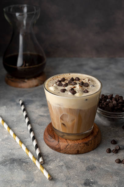 istock Coffee and vanilla ice crem with chocolate , coffee beans in glass cup, copy space. Lisestyle iced coffee drink. 1421569843