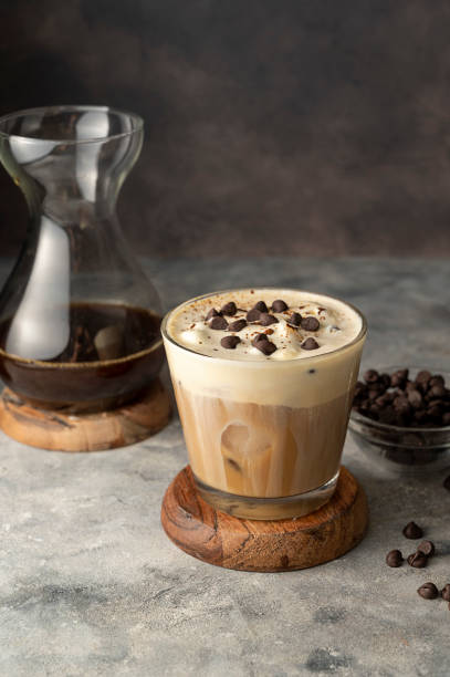 istock Coffee and vanilla ice crem with chocolate , coffee beans in glass cup, copy space. Lisestyle iced coffee drink. 1421569852
