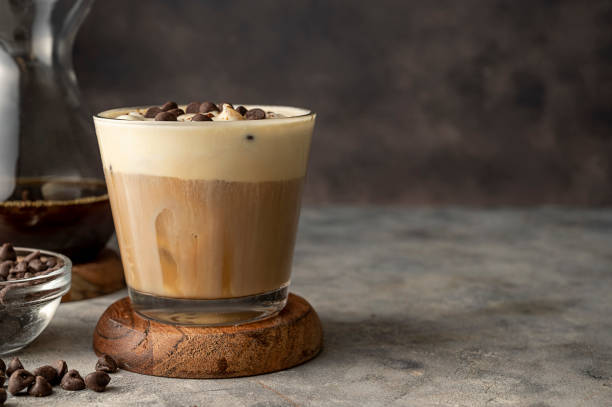 istock Coffee and vanilla ice crem with chocolate , coffee beans in glass cup, copy space. Lisestyle iced coffee drink. 1421569914