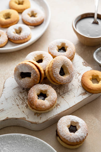 istock Cooking cookies process. Homemade linzer cookies with chocolate. 1421571783