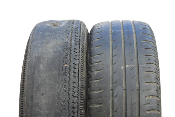 old worn out summer tires isolated on white background - truck wheel car macro imagens e fotografias de stock