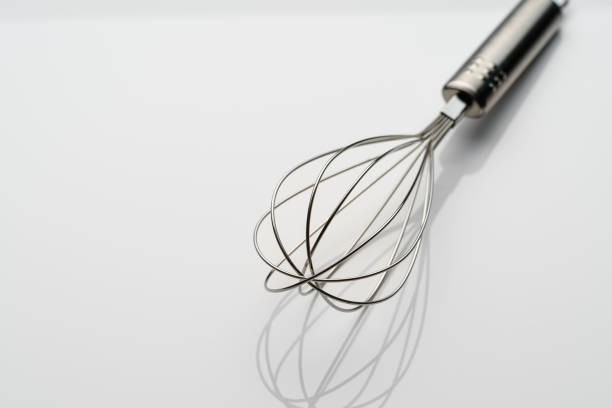 istock stainless whisk isolated on white background 1421578456