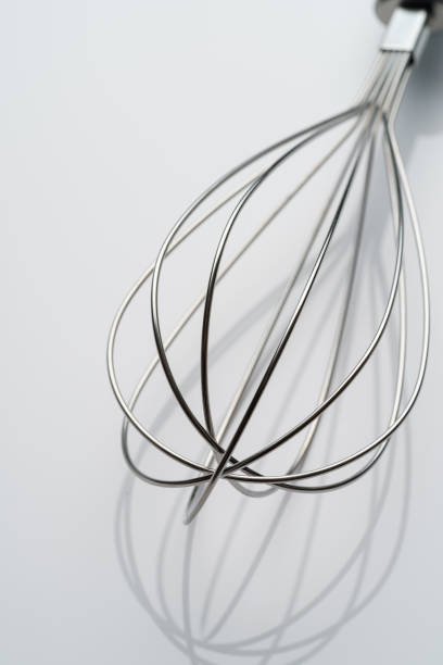 istock stainless whisk isolated on white background 1421578466