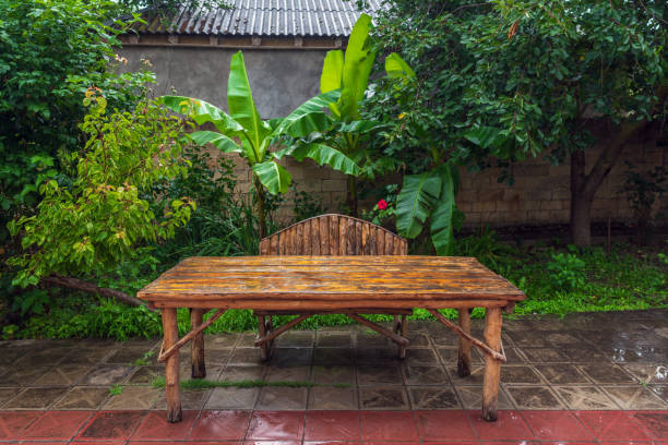 Old wet wooden table after rain