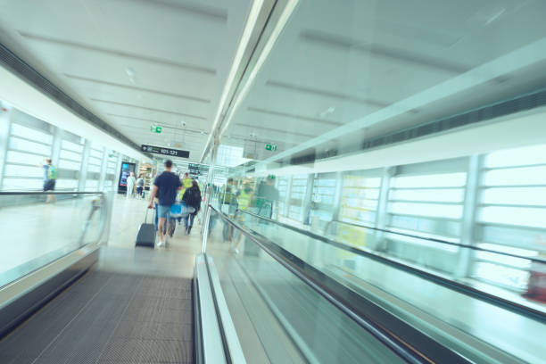 istock Moving sidewalk in airport terminal 1421579734