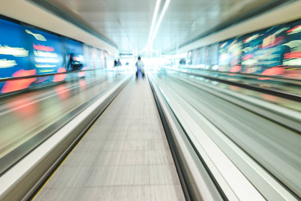 istock Moving sidewalk in airport terminal 1421579766