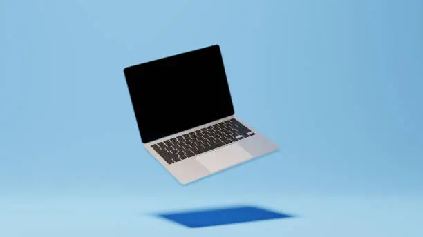 Photo of Laptop computer mockup with black empty screen, aluminum body. 3D render mock up of generic pc. Technology, communication, internet, digital. Creative design for advertisement, blue background.