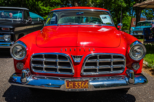 Falcon Heights, MN - June 17, 2022: Low perspective front view of a 1955 Chrysler C300 2 Door Hardtop Coupe at a local car show.