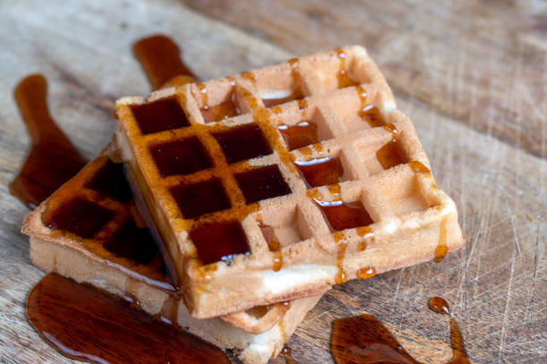 istock square sweet soft waffles in bee honey 1421581756