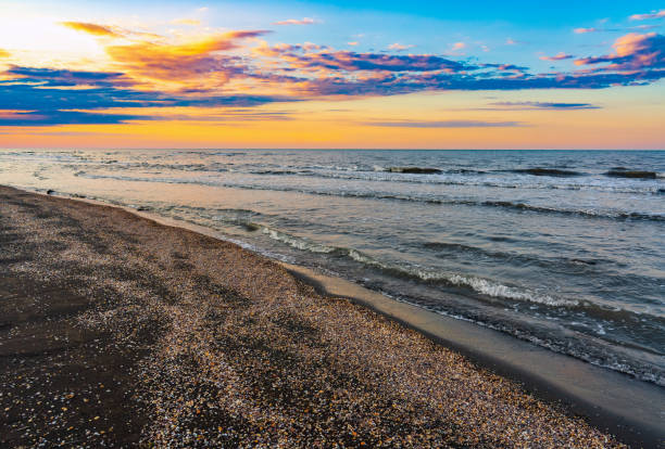 istock Sea coast after a colorful sunset 1421584415