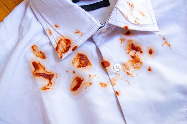 istock Food stains on a white shirt 1421586406