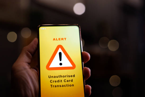 istock Financial fraud alert message on smartphone 1421586692