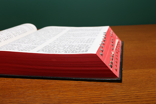 Open Holy Bible on  table