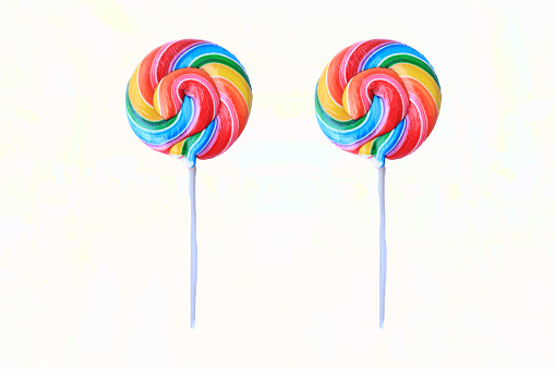 lollipop, Colorful rainbow lollipop swirl on plastic stick isolated on white background
