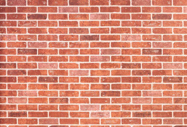 istock Texture of old orange dark brick wall, macro. Abstract red stone vintage background. 1421591974