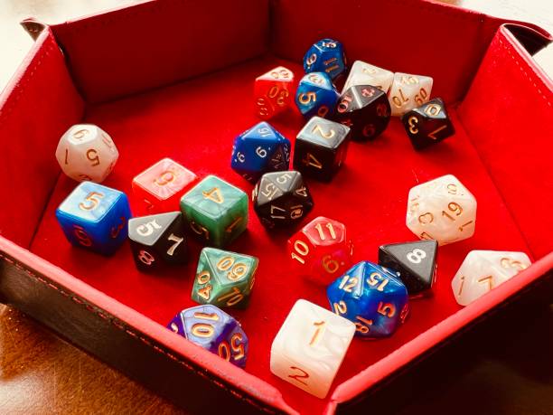 istock Roll playing dice in red velvet holder 1421592300