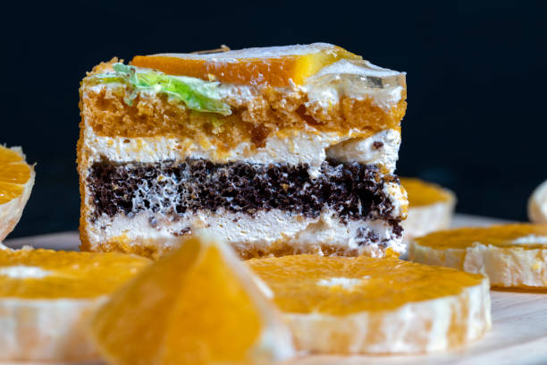 istock sliced fresh oranges and a piece of orange dessert 1421593097