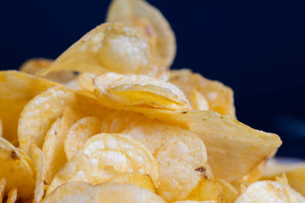 istock scattered potato chips with natural spices 1421593172