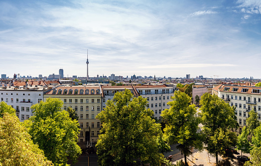 wide panoramic view on Berlin cityscape with tv tower seen from tower of the zionskirche
