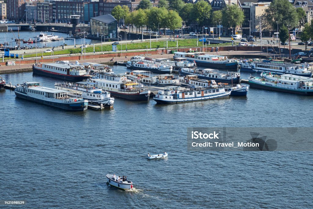 Aerial view of boats at oosterdok waterfront on a summer day, Amsterdam Aerial view of boats at oosterdok waterfront on a summer day, Amsterdam, The Netherlands Aerial View Stock Photo