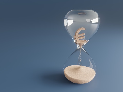 Flowing sand shaped of Euro sign inside the hourglass, symbolizing inflation nand monetary erosion. (3d render)